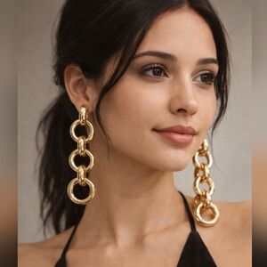 Long earrings made with three interlocking twisted circle pieces